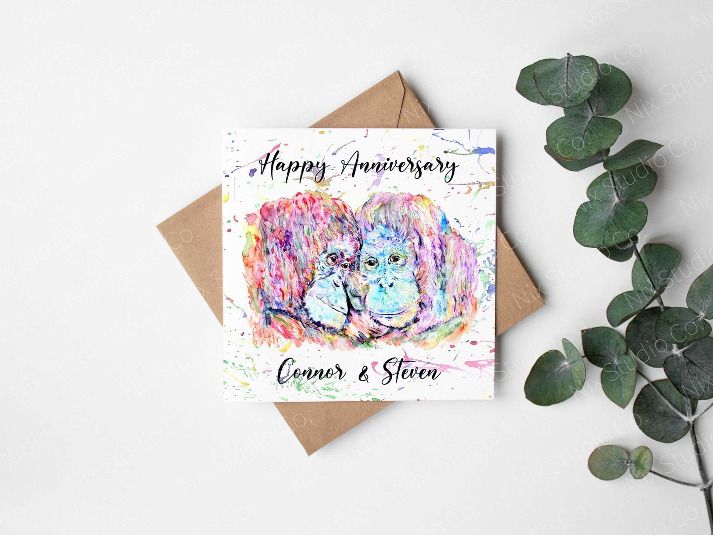 square card with a pair of apes in a colourful watercolour design printed on the front with the text happy anniversary
