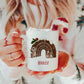 white mug with a cute christmas pudding and mouse design printed on it with a name below