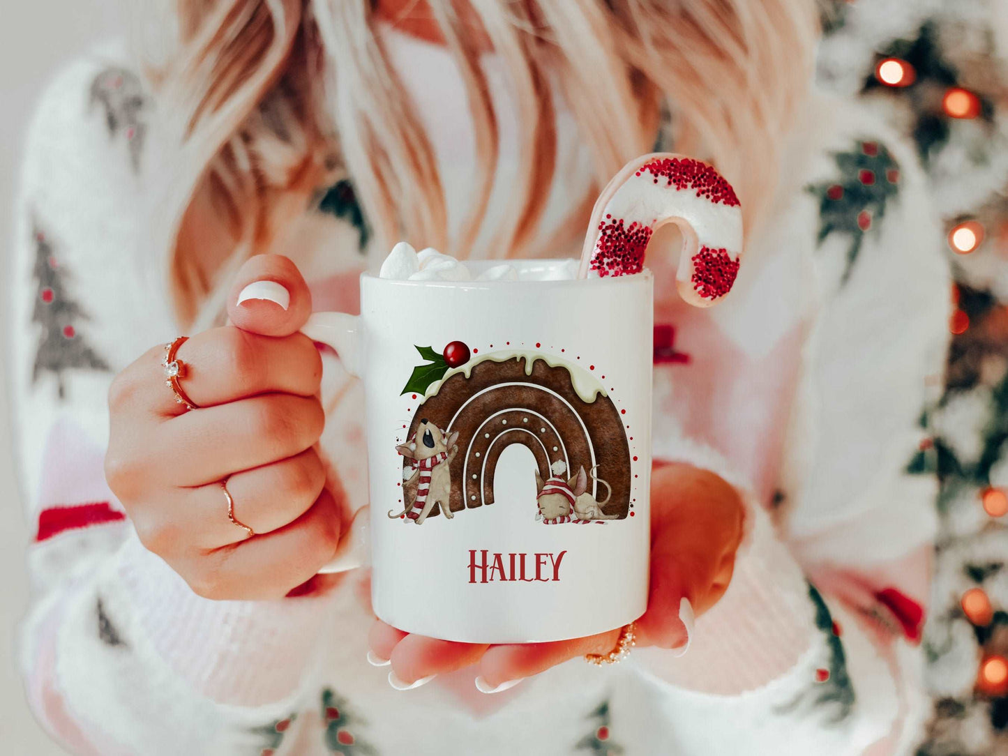 white mug with a cute christmas pudding and mouse design printed on it with a name below
