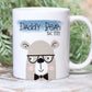 white mug with a bear illustration printed on and the text daddy bear est. 2022 printed over a blue brushdtroke above.