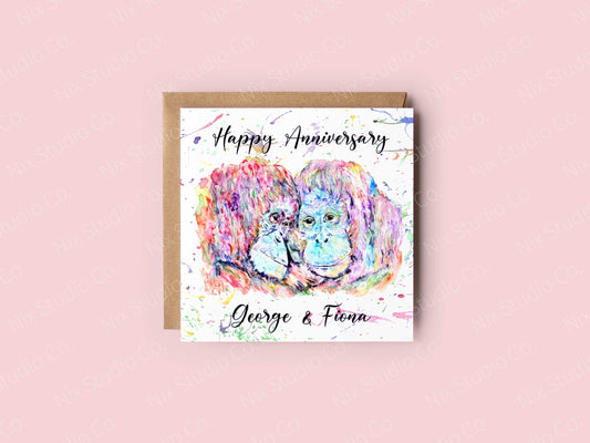 square card with a pair of apes in a colourful watercolour design printed on the front with the text happy anniversary