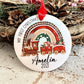 white ceramic bauble with a cute Christmas themed train and mouse design printed on with the text my first Christmas and name and year 2022 printed on