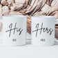 set of two white mugs. One has the text His in a script font with a name below and the other has Hers with a name below. 
